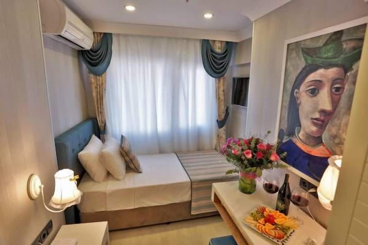 Habitación individual estándar | Sábanas de algodón egipcio, ropa de cama de alta calidad y edredón