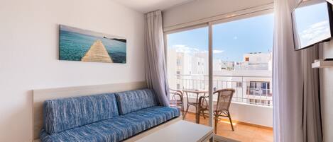 Apartment, 1 Bedroom, Balcony | In-room safe, desk, blackout drapes, iron/ironing board