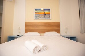 Apartamento Suite | Minibar, escritorio, wifi gratis y ropa de cama
