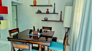 Design Apartment, 2 Bedrooms, Non Smoking, Kitchen | Living area | 50-inch flat-screen TV with cable channels, TV, DVD player