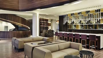 Cocktail bar, poolside views, open daily