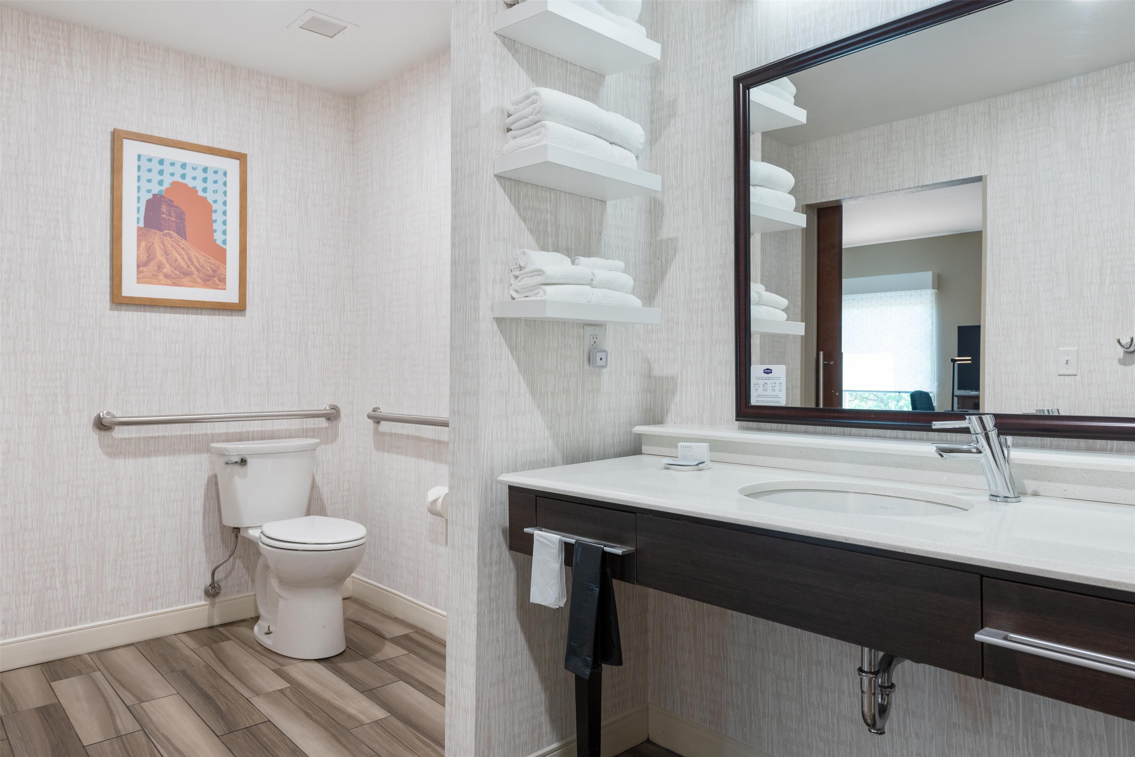 studio, 1 king bed, accessible (roll in shower) | bathroom | combined shower/bathtub, deep-soaking bathtub, free toiletries