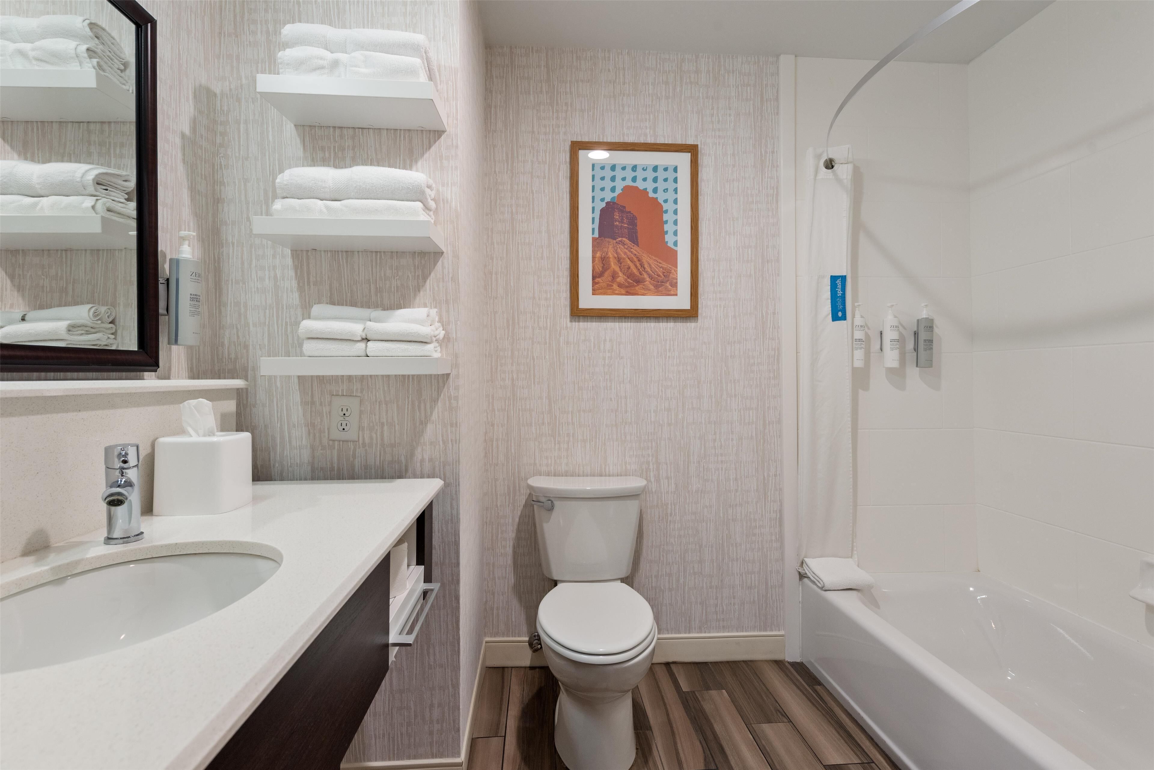 combined shower/bathtub, deep-soaking bathtub, free toiletries