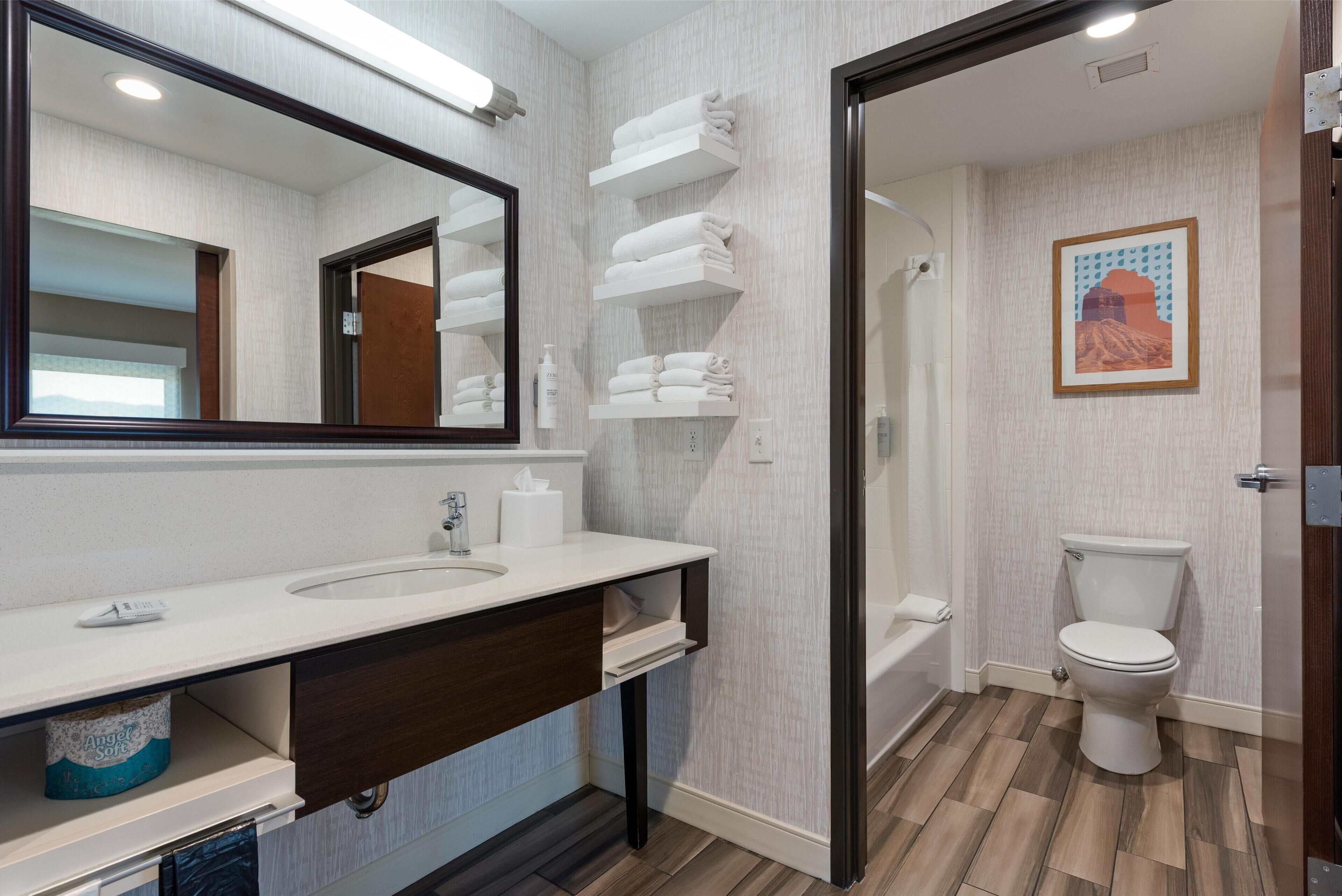 combined shower/bathtub, deep-soaking bathtub, free toiletries