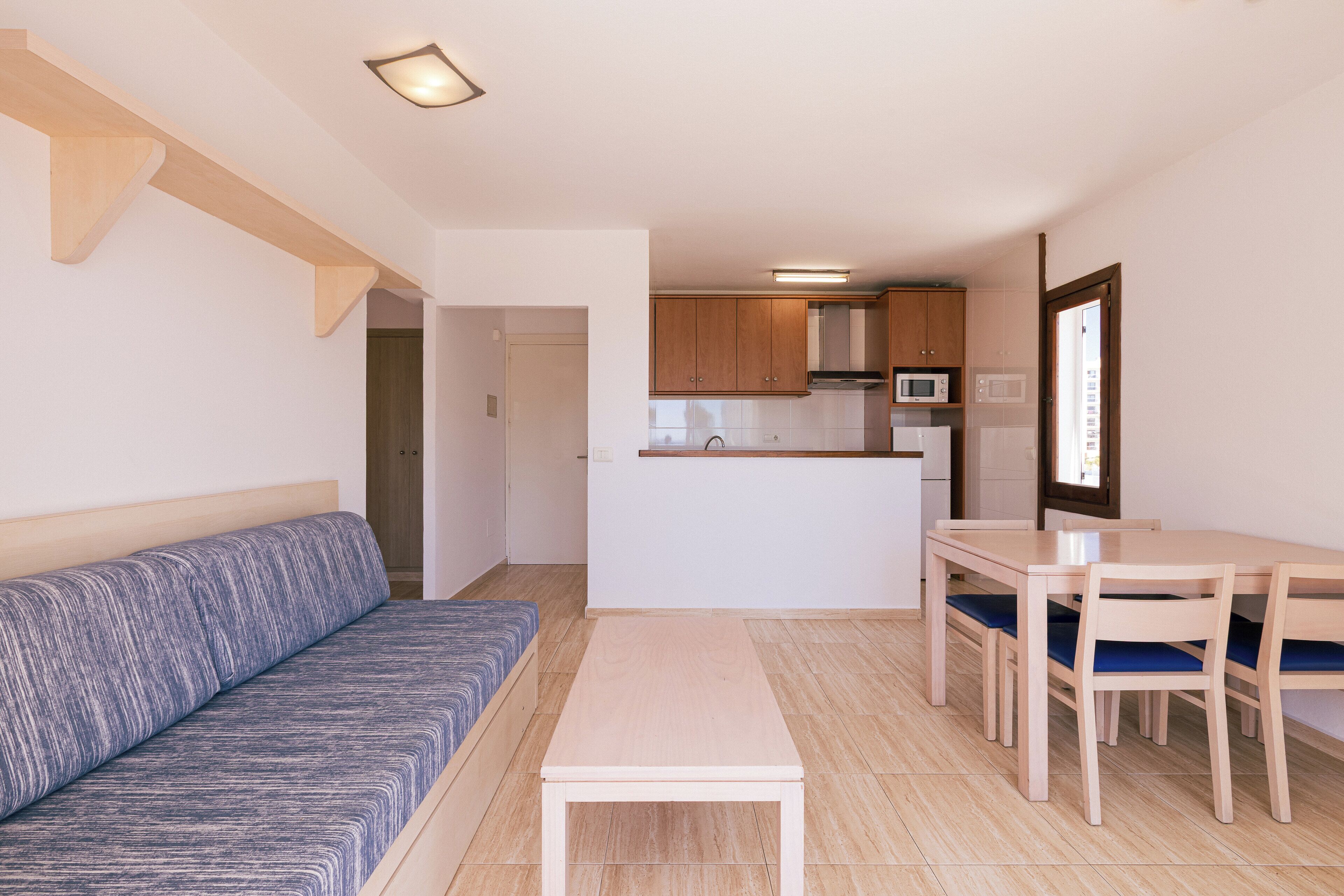 Apartamento, 1 habitación | Zona de estar | Una televisión de pantalla plana