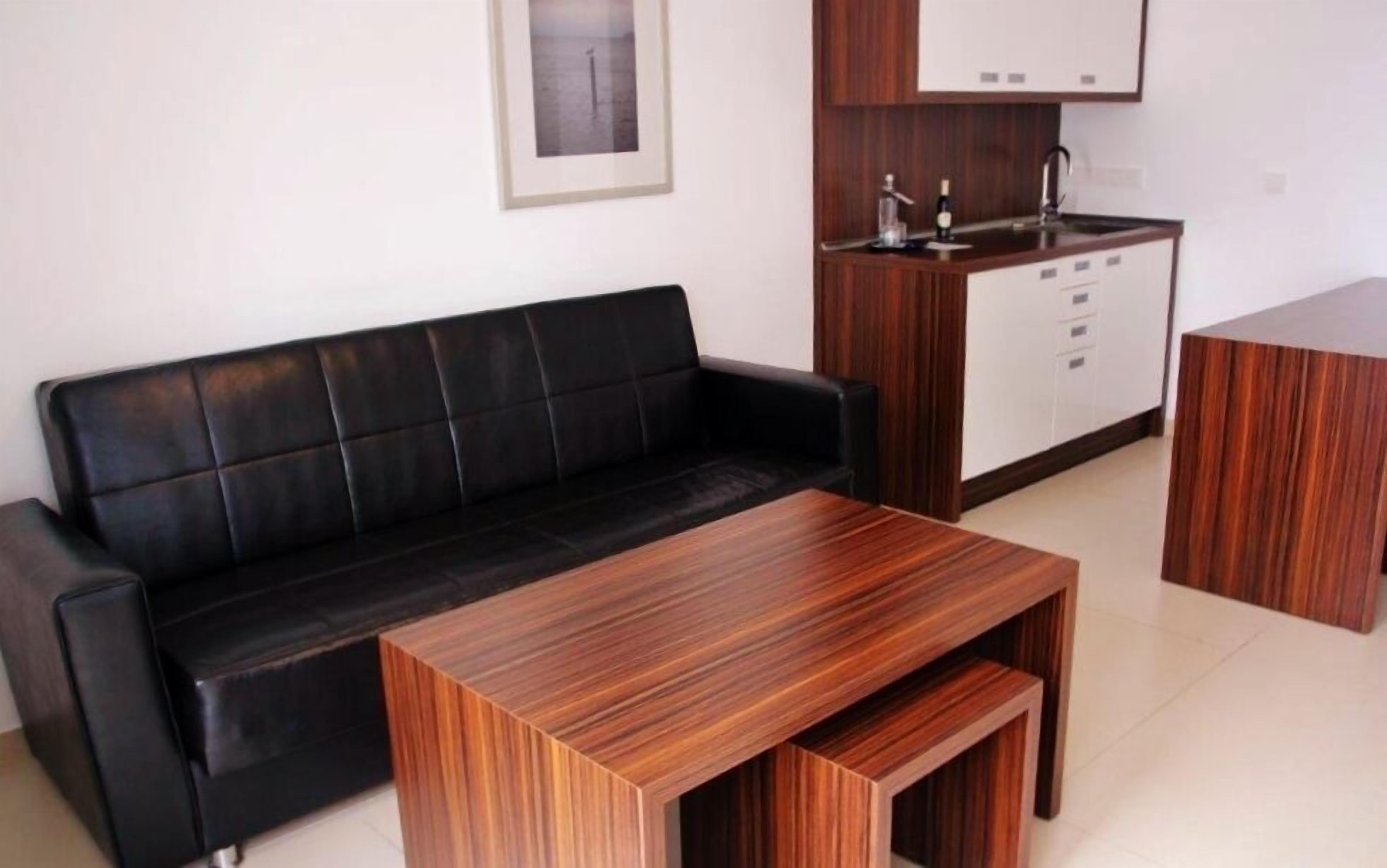 apartment, 1 bedroom | minibar, in-room safe, blackout curtains, iron/ironing board