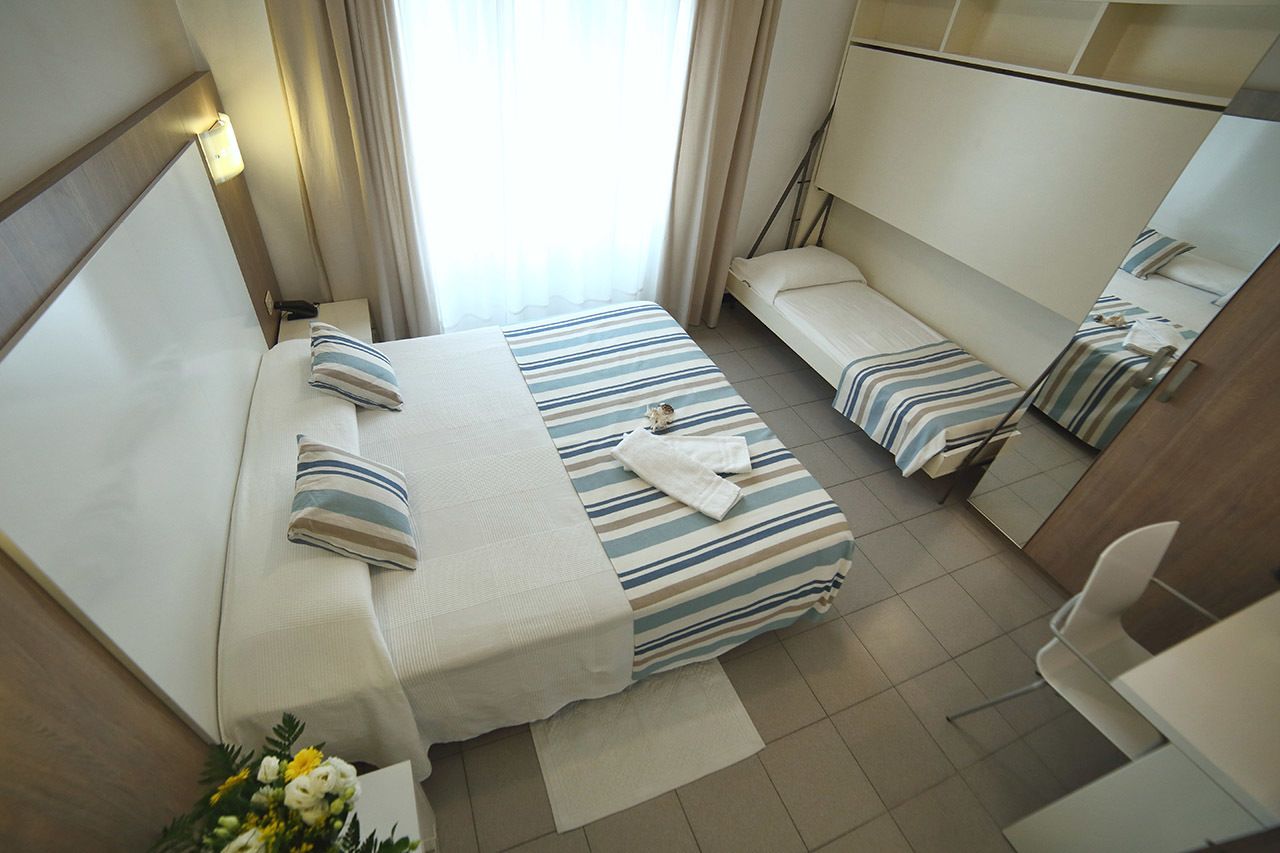 triple room | frette italian sheets, premium bedding, in-room safe, desk