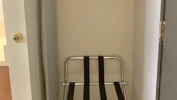 Premium bedding, desk, laptop workspace, blackout drapes