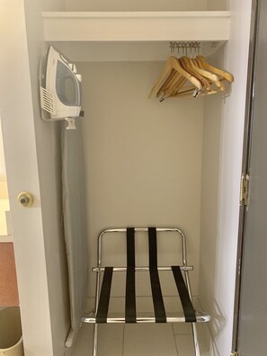 Premium bedding, desk, laptop workspace, blackout curtains