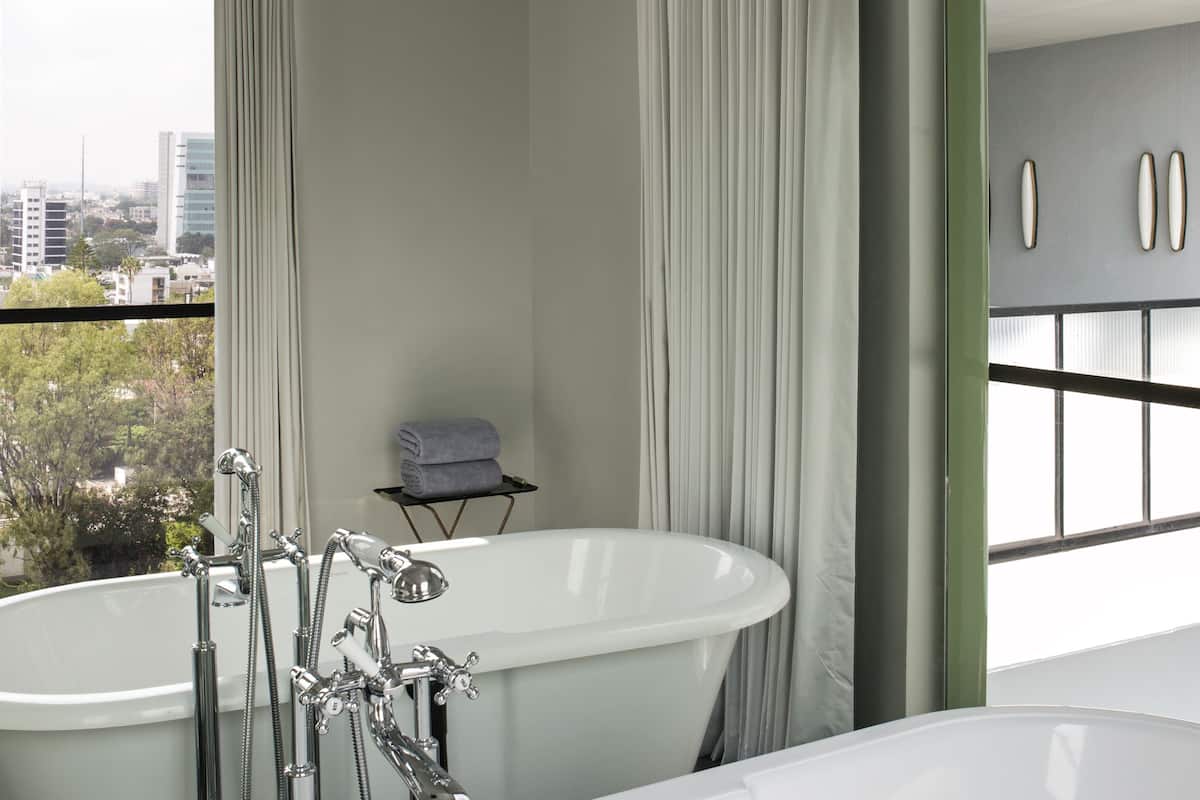 shower, rainfall showerhead, designer toiletries, hair dryer