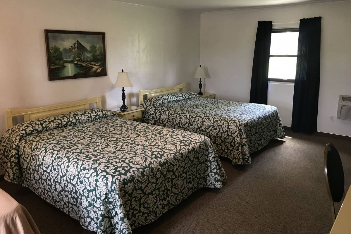 Deluxe Room, 2 Queen Beds | Desk, WiFi (free), bed sheets