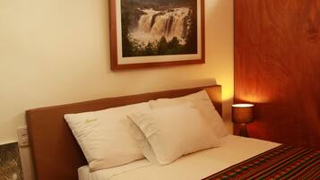 Deluxe Room, Private Bathroom | In-room safe, individually decorated, desk, laptop workspace