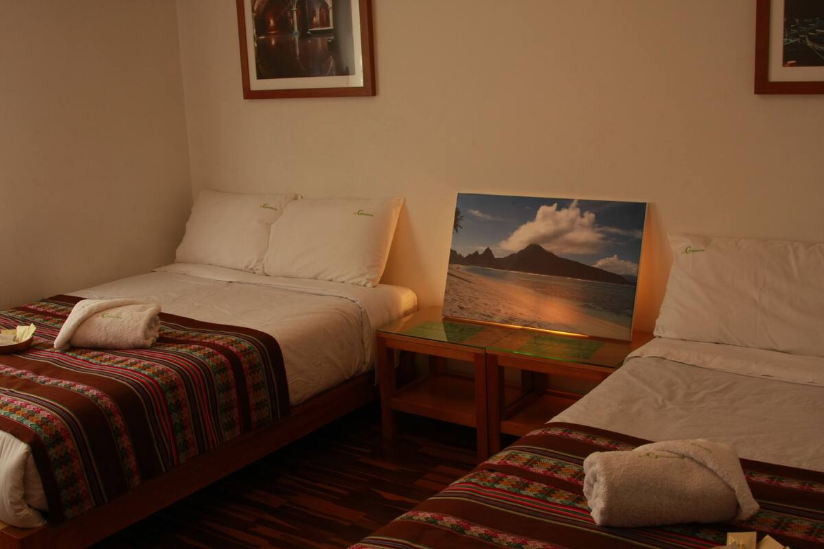 Deluxe Double Room, Multiple Beds, Shared Bathroom | In-room safe, desk, laptop workspace, WiFi (free)