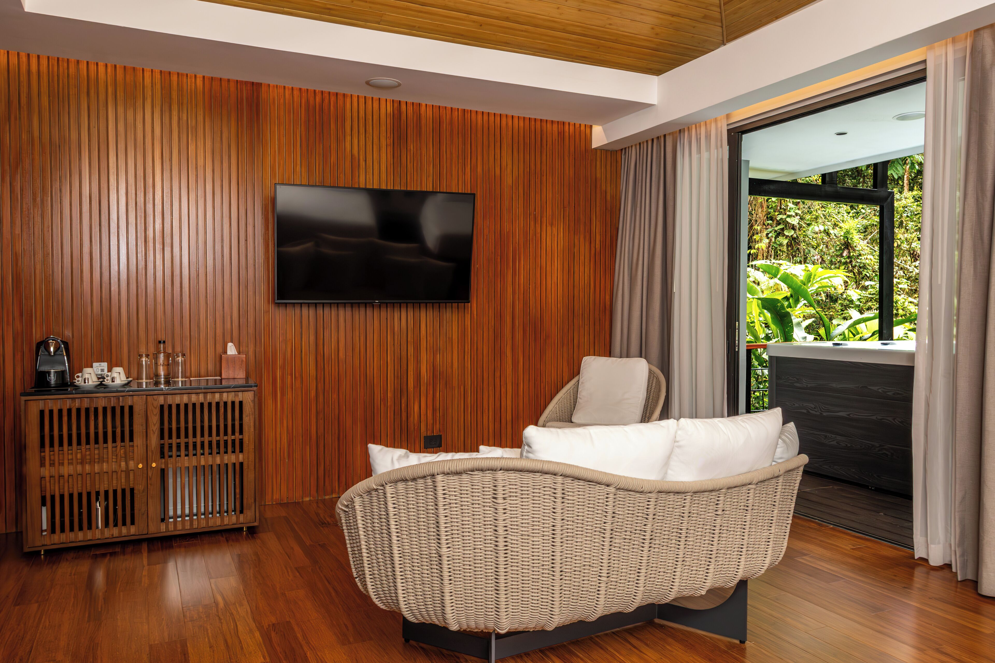 premium quadruple room | living area | 40-inch flat-screen tv with cable channels, tv