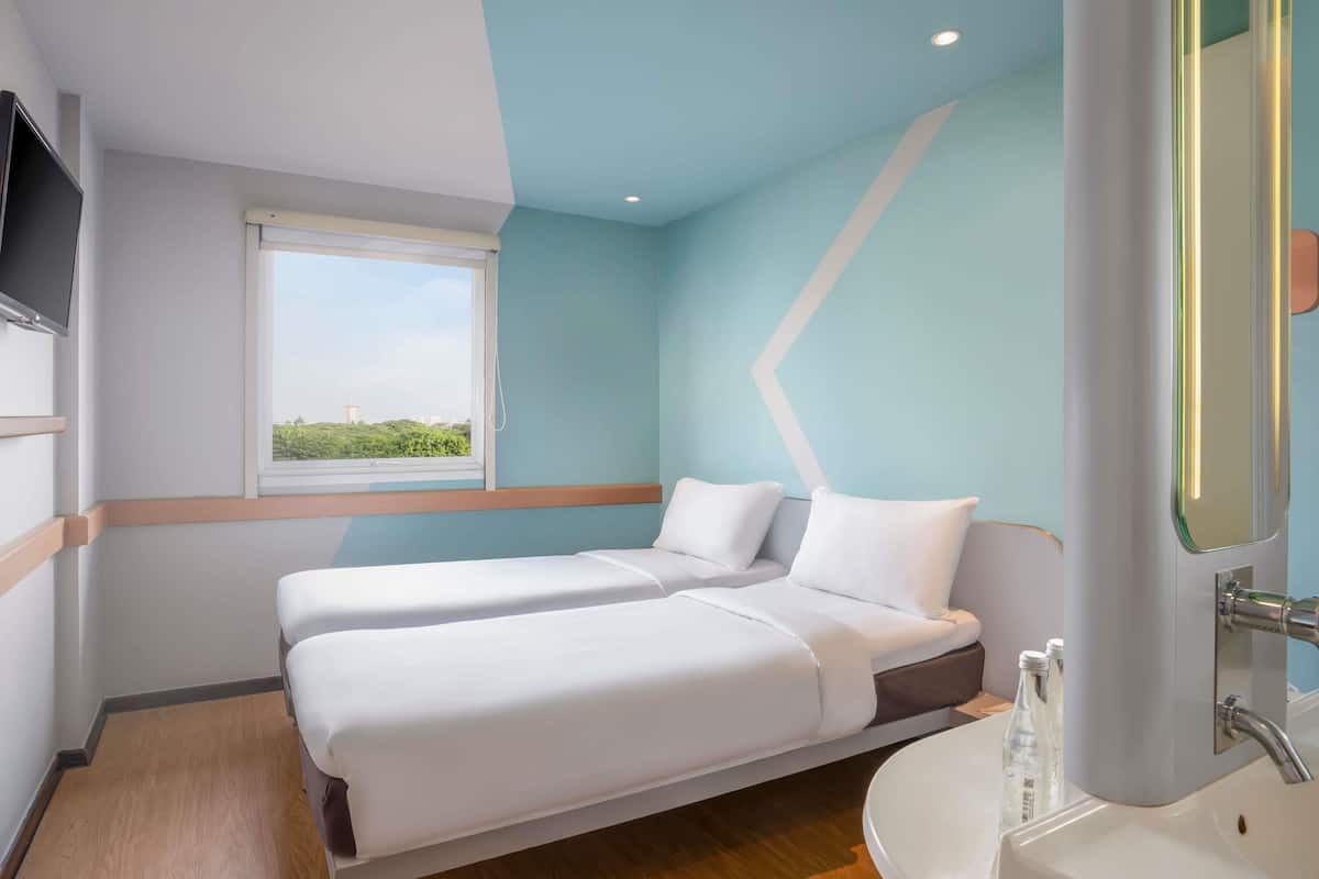 standard room, 2 single beds | pillow-top beds, in-room safe, blackout curtains, iron/ironing board