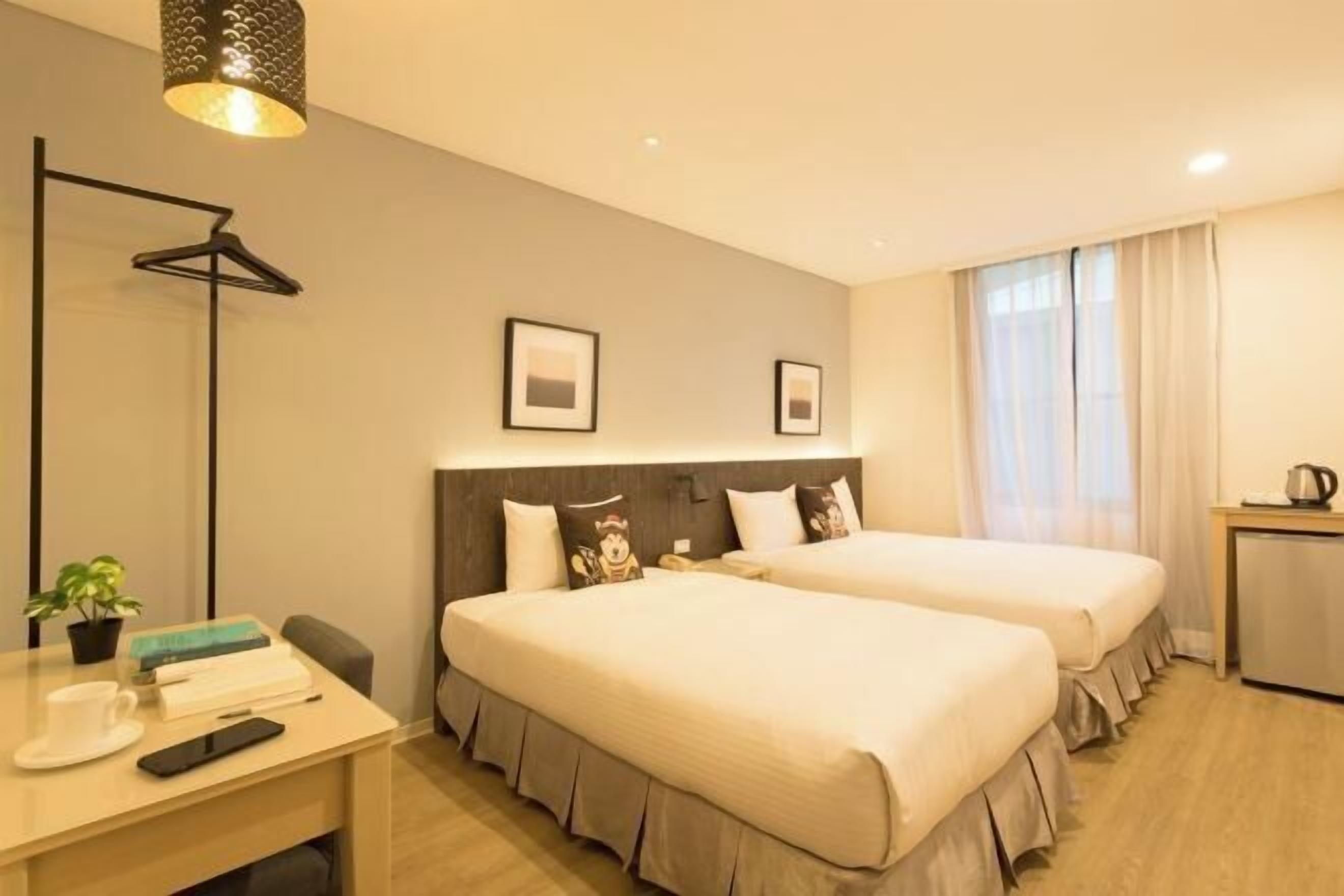 Premium bedding, down comforters, pillowtop beds, desk