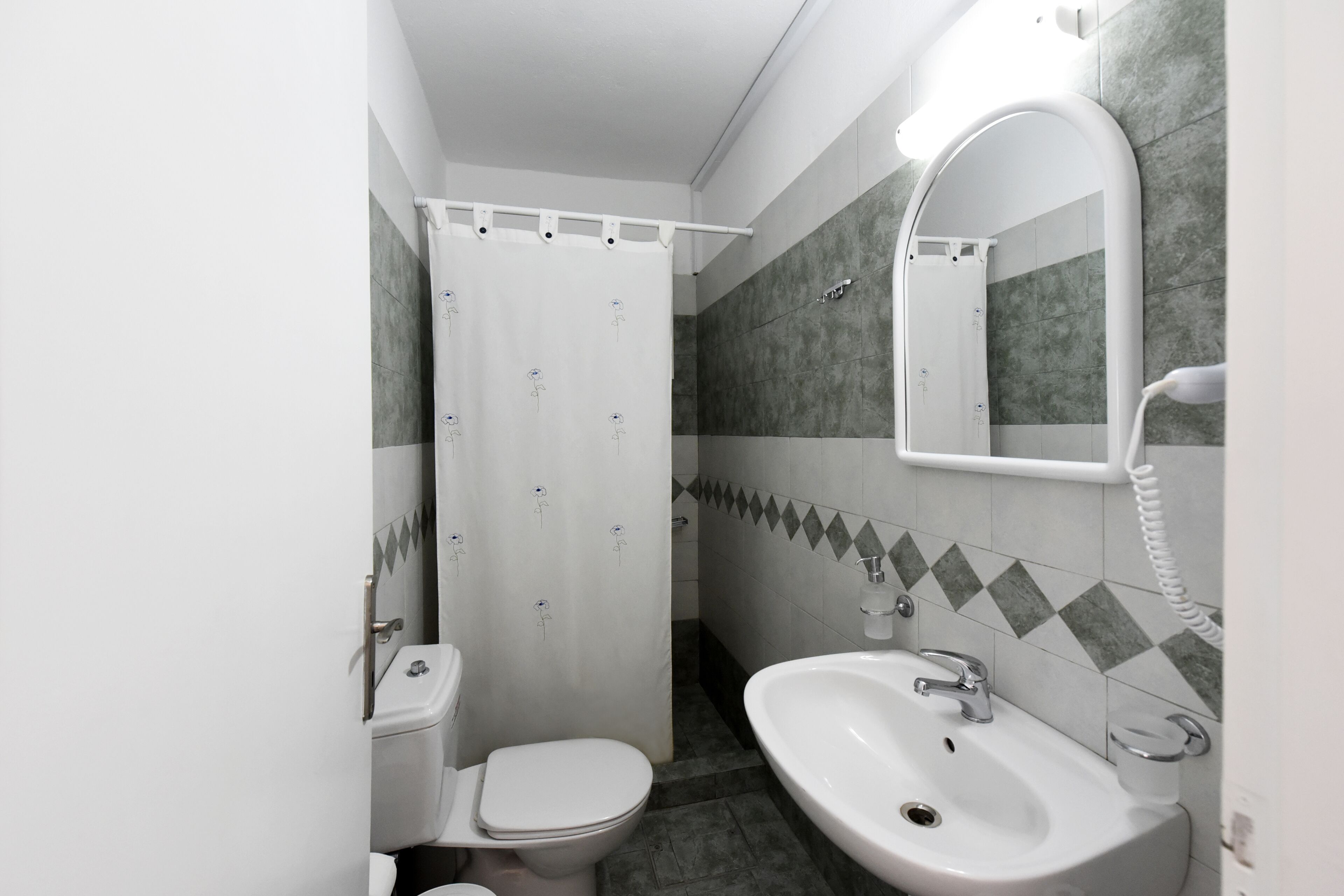 standard apartment | bathroom | shower, free toiletries, hair dryer, slippers