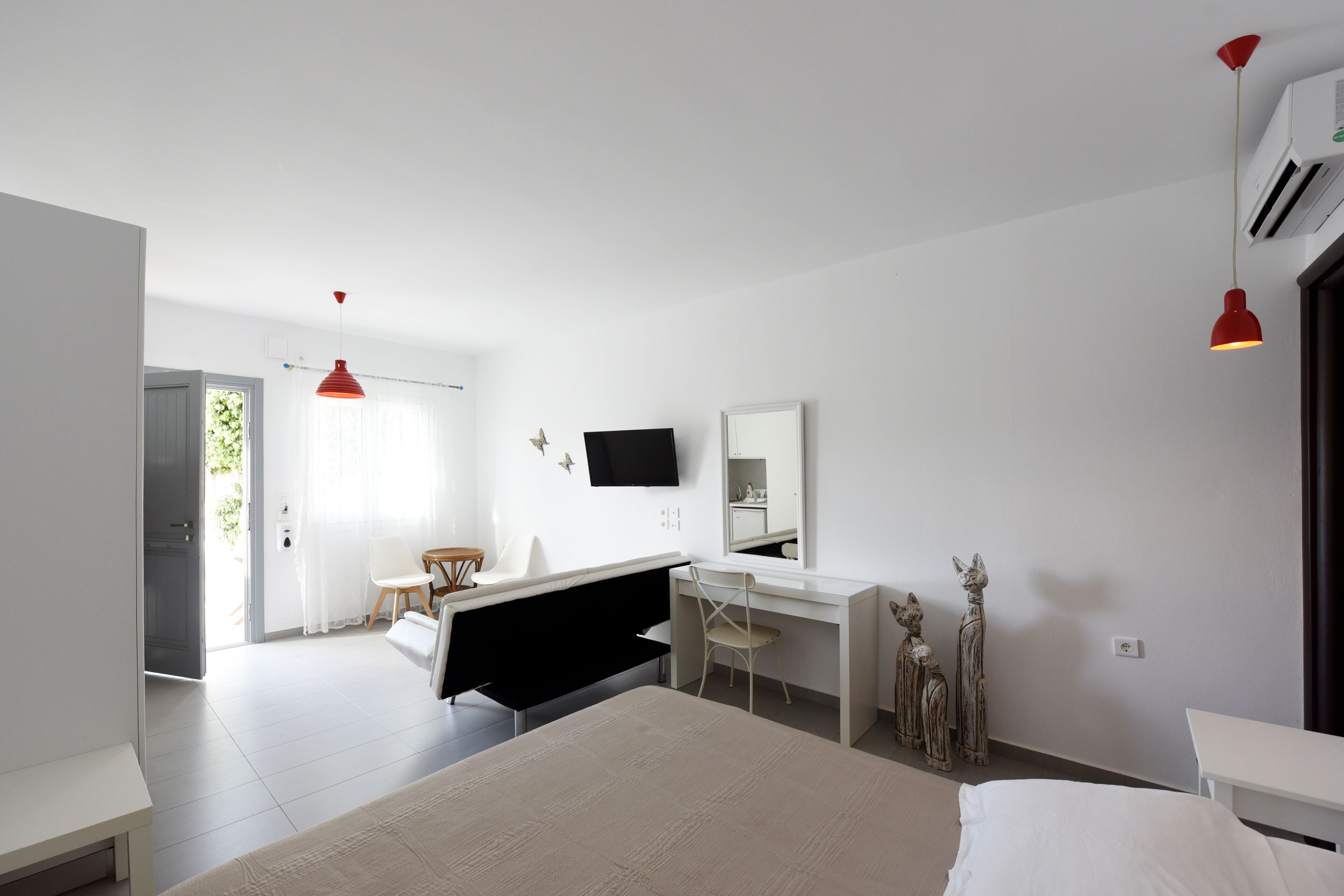 superior studio | living area | flat-screen tv