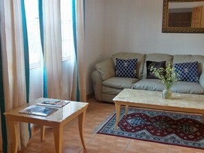 Royal Suite, 2 Bedrooms, Balcony, Garden View | Living area - Cool Running Apartments (St. George's)