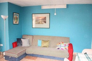 Premier Suite, 1 King Bed, Non Smoking, Kitchenette | Living room - Cool Running Apartments (St. George's)