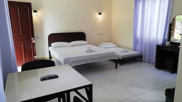 Suíte família | Roupas de cama premium, frigobar, escrivaninha, Wi-Fi de cortesia