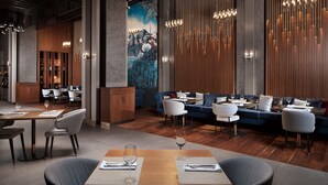 A modern dining area with a wooden table, chairs, and a mural on the wall. - Delta Hotels By Marriott Istanbul Levent (Istanbul)
