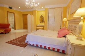 Junior Suite, Jetted Tub and Terrace (Victoria) | Desk, blackout drapes, soundproofing, iron/ironing board