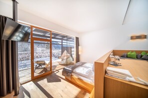 Suite | Hochwertige Bettwaren, Zimmersafe, Schreibtisch, schallisolierte Zimmer