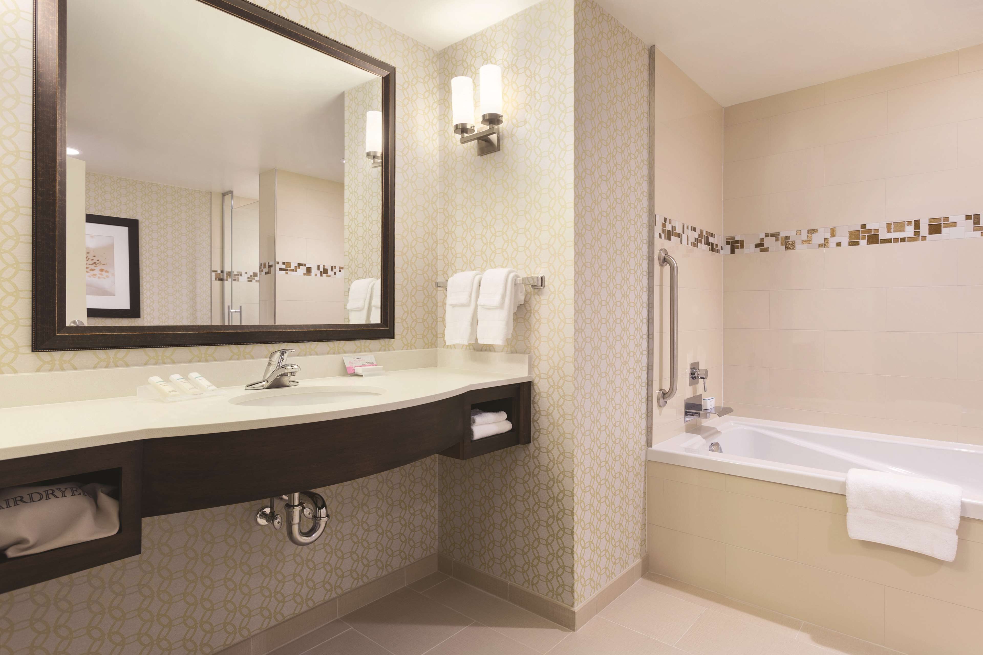 suite, 1 king bed | bathroom | free toiletries, hair dryer, towels, soap