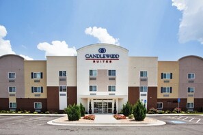 A hotel with a central entrance, multiple floors, and a parking lot. - Candlewood Suites Casper by IHG (Casper)