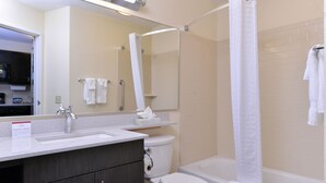 A modern bathroom with a sink, toilet, and bathtub. - Candlewood Suites Casper by IHG (Casper)