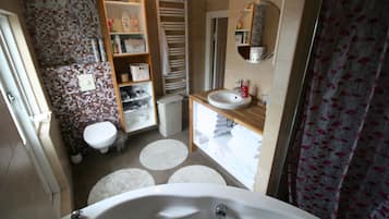 Separate bathtub and shower, jetted bath, hair dryer, towels
