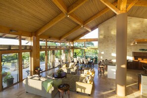 Casa Caiman - Villa | Área de estar | TV de tela plana