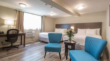 Tabla de planchar con plancha, wifi gratis y ropa de cama