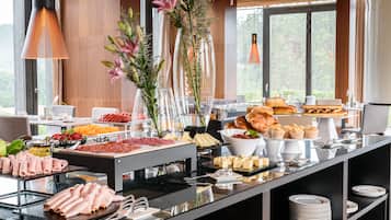Daily buffet breakfast (EUR 12.00 per person)