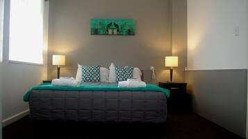 Double Room | Iron/ironing board, cribs (free), WiFi (free), bed sheets