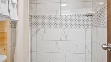 Shower, free toiletries, hair dryer, towels