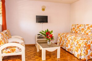 Appartement, 1 slaapkamer | Woonkamer | Een flatscreentelevisie