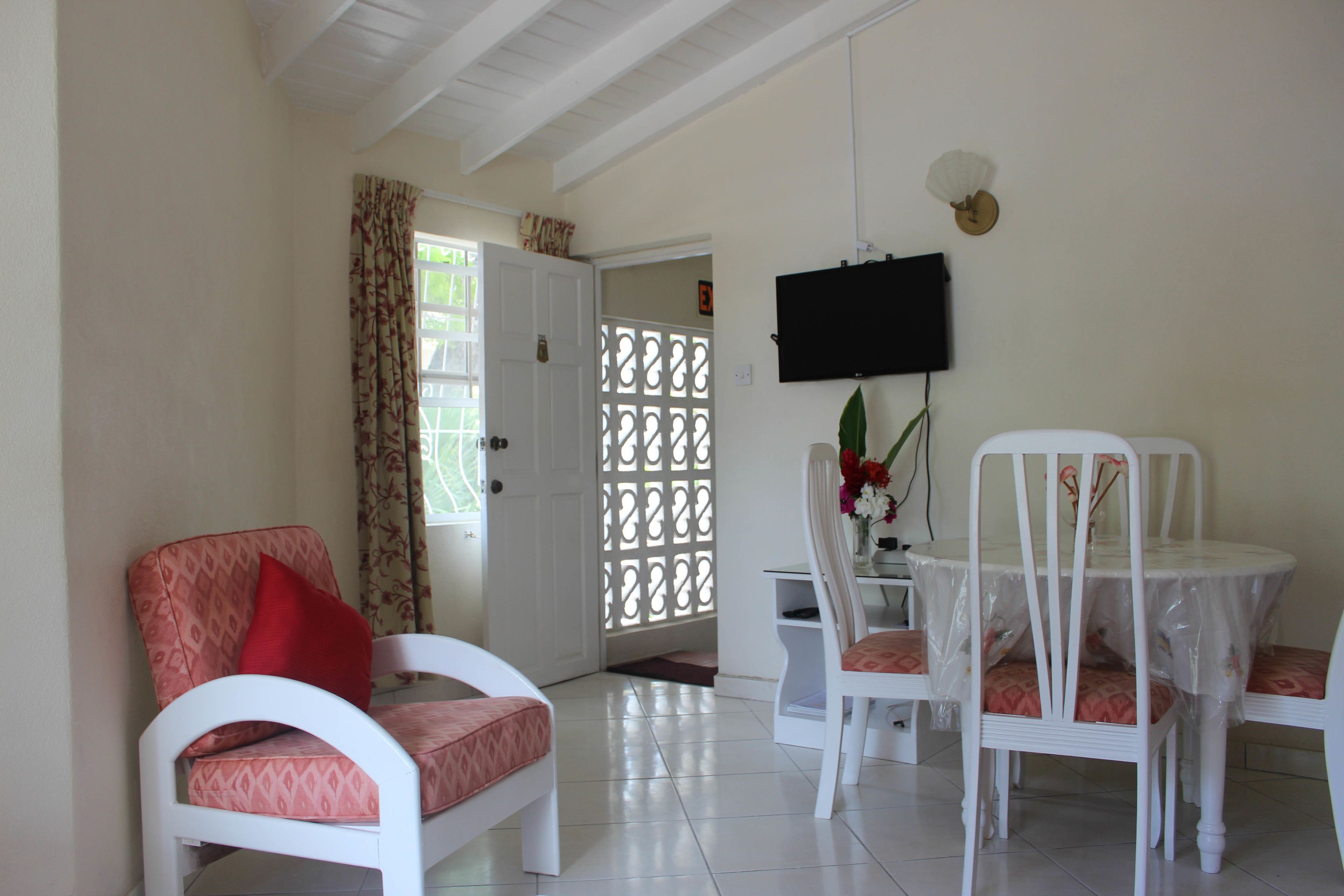 Apartamento, 1 habitación | Zona de estar | Una televisión de pantalla plana