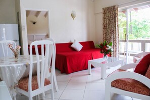 Apartment, 1 Bedroom | Living area | Flat-screen TV - Mirabelle Apartments (St. Lawrence Gap)