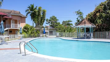 Outdoor pool, pool umbrellas, pool loungers