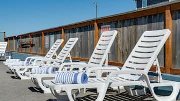 Seasonal outdoor pool, open 10:00 AM to 6:30 PM, sun loungers