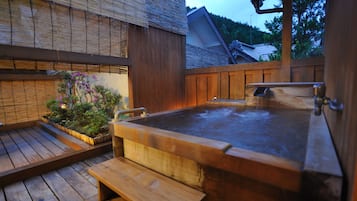 Superior Japanese-Style Room with Open-Air Bath | Bathroom | Hair dryer, slippers, electronic bidet, towels