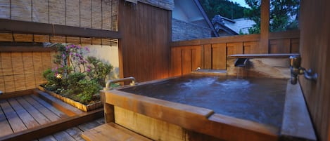 Superior Japanese-Style Room with Open-Air Bath | Bathroom | Hair dryer, slippers, electronic bidet, towels