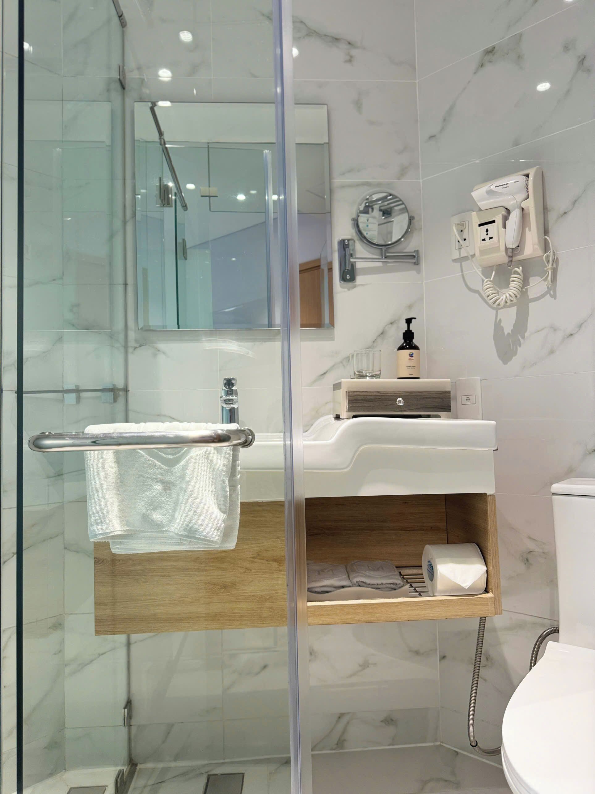 bathroom | shower, hair dryer, bathrobes, slippers