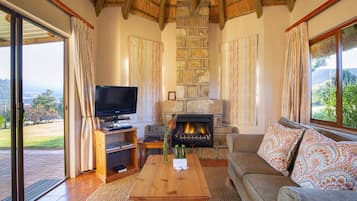 40-inch flat-screen TV with satellite channels, TV, fireplace