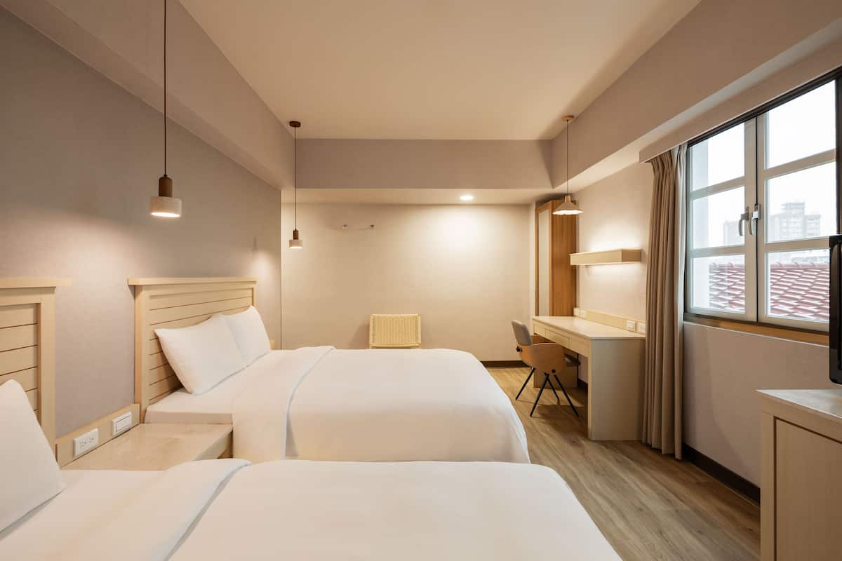 deluxe triple room | desk, soundproofing, iron/ironing board, free cots/infant beds