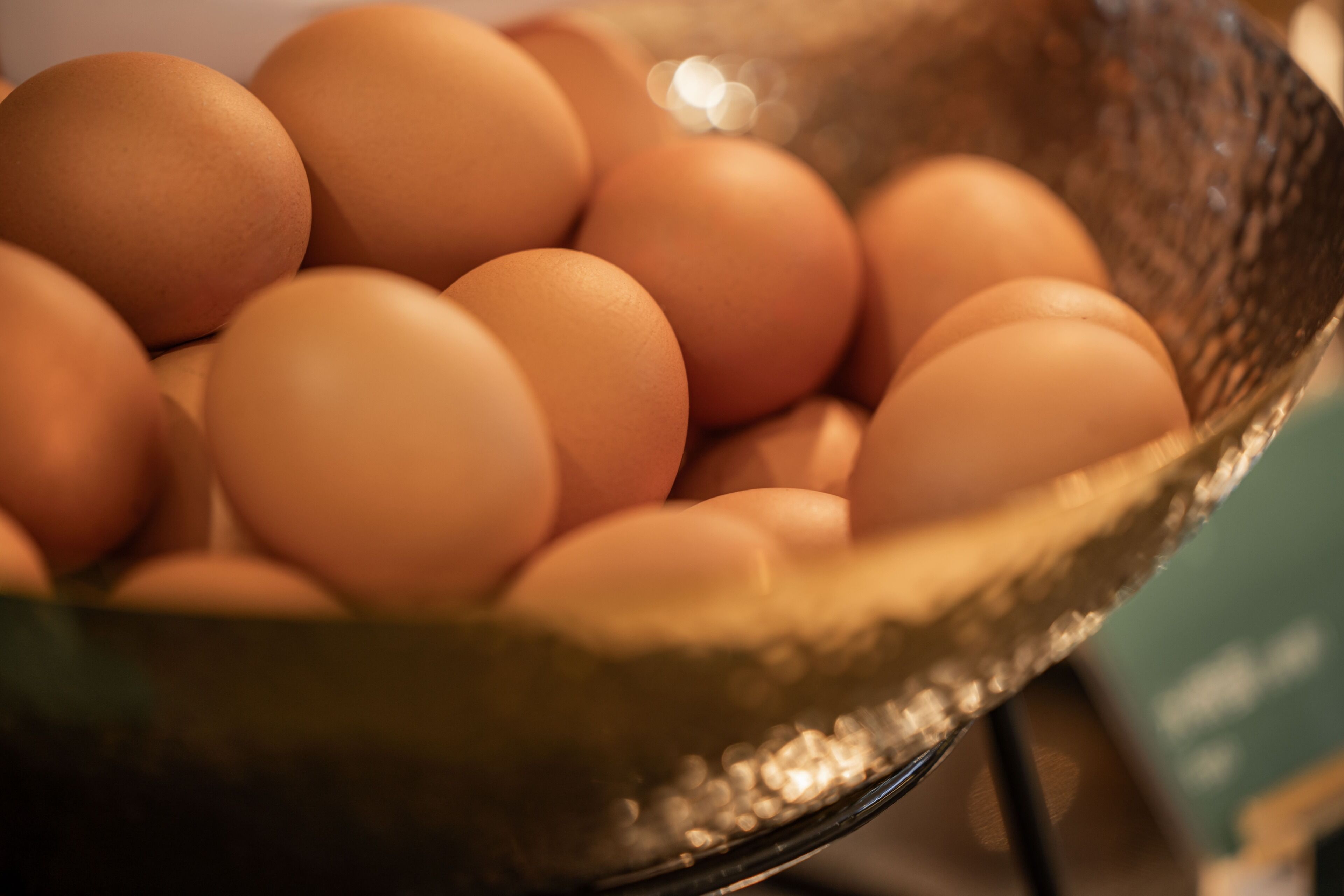A bowl filled with eggs.