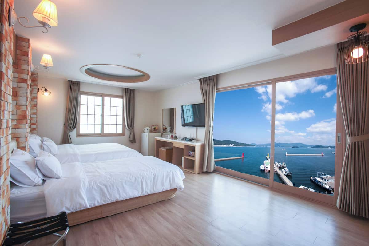 Kamar Triple Deluks | Wi-Fi gratis dan seprai linen