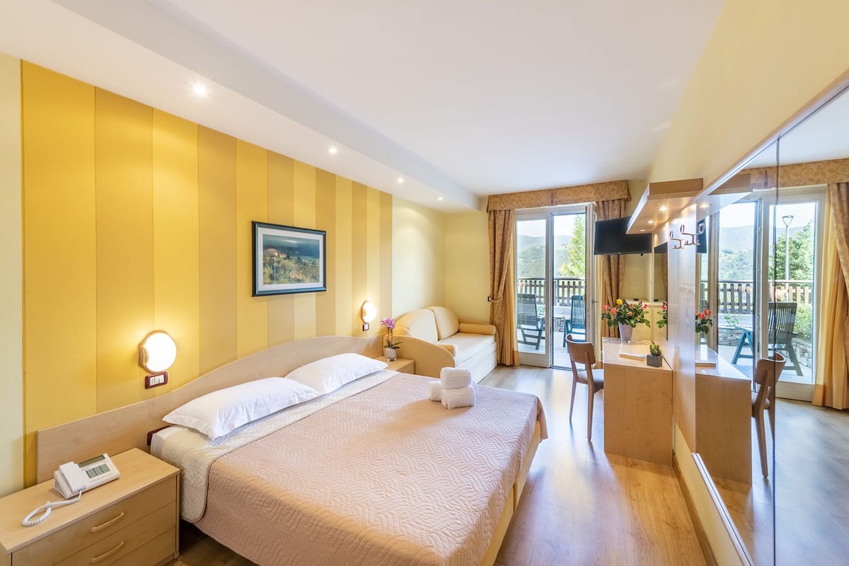 standard room, mountain view | in-room safe, free wifi, bed sheets